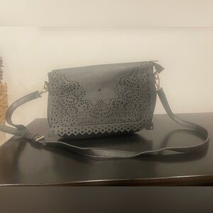 Capelli of New York Black Crossbody Bag with Laser-Cut Design-barely loved